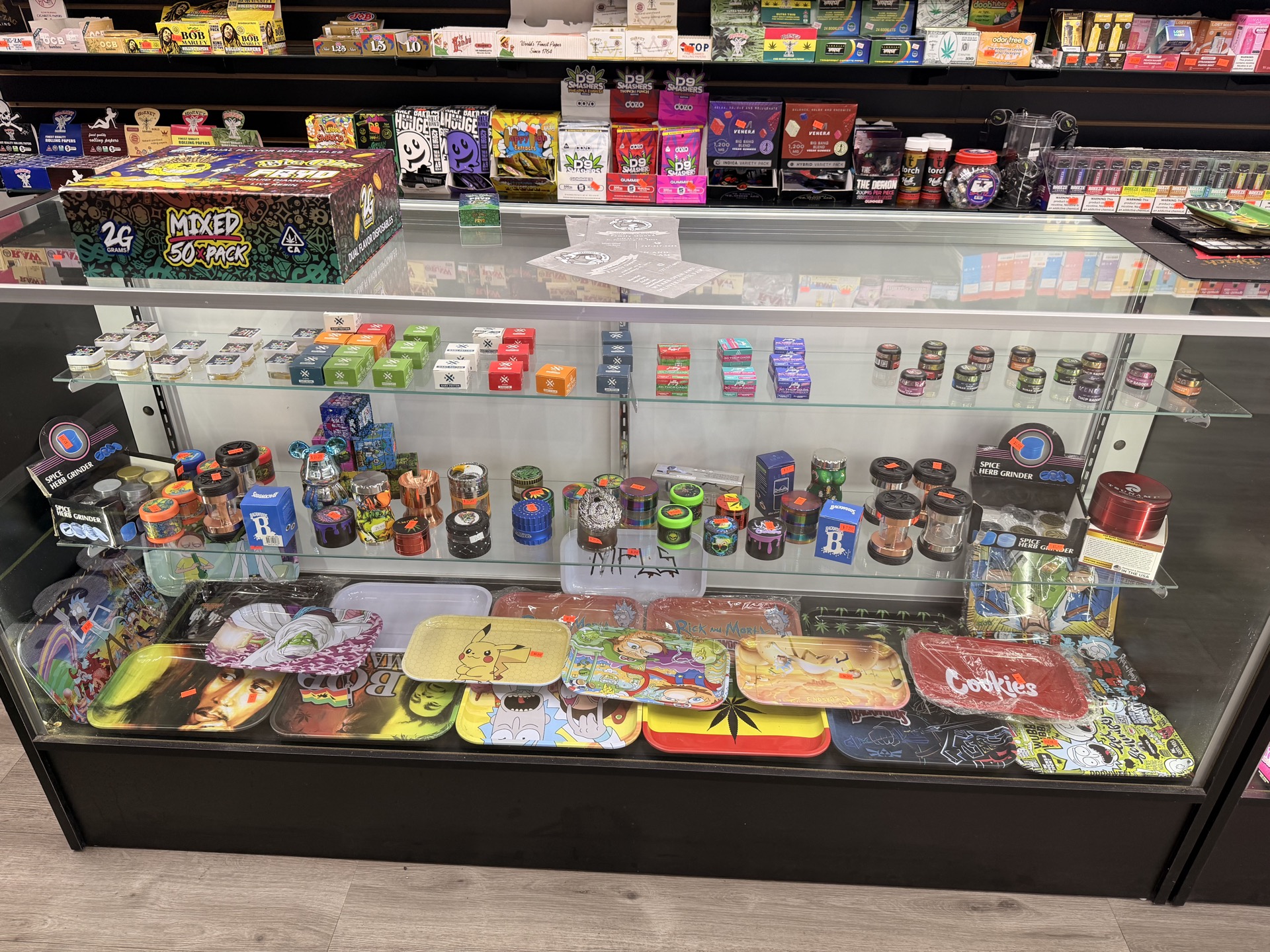 Rolling trays, grinders, and smoking accessories at High Mood Smoke Shop